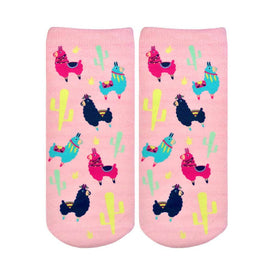 pink ankle socks for women featuring a pattern of blue, green, yellow, and black llamas wearing saddles and feathers against a backdrop of cacti.   
