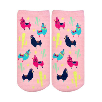 pink ankle socks for women featuring a pattern of blue, green, yellow, and black llamas wearing saddles and feathers against a backdrop of cacti.   