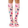 Pair of pink knee-high socks with colorful llamas and cacti print. Fun and whimsical design. [lf]