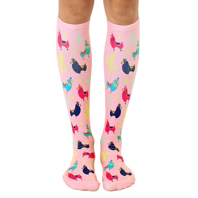 knee high women's pink socks with multicolored party-ready patterned flamingos.  