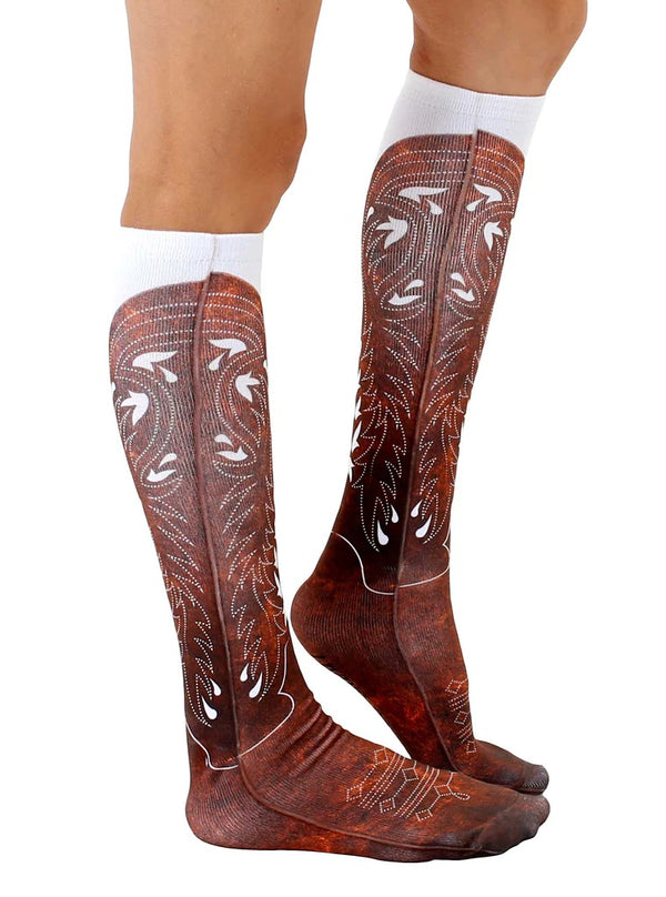 Lifestyle shot showing the socks on a person's legs, emphasizing their knee-high length and the brown cowboy boot design. [lf]
