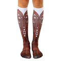 Pair of knee-high socks showcasing a brown cowboy boot design on a white background.  Detailed stitching and wear effects are visible. [lf]