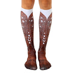 Pair of knee-high socks showcasing a brown cowboy boot design on a white background.  Detailed stitching and wear effects are visible. [lf]