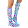Lifestyle shot showing the Unicorn Party knee-high socks on a person's legs, showcasing how they look when worn. [lf]