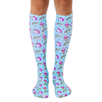 Pair of pastel blue knee-high socks with an all-over print of unicorns, rainbows, and ice cream cones. [lf]