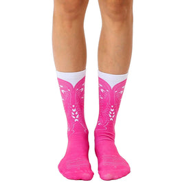  pink crew socks with white tops and white pattern resembling cowgirl boot, available in women's sizes.    