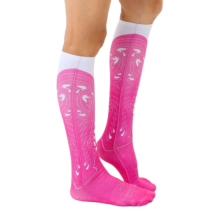 A pair of pink socks that are made to look like pink cowboy boots.