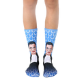 Crew socks in blue featuring a portrait of Ruth Bader Ginsburg.  The background pattern is white laurel wreaths. [lf]