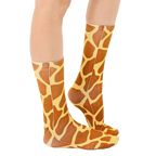 Lifestyle shot of a person wearing the giraffe print socks, showing how they look when worn. [lf]