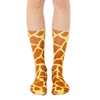 A pair of brown and tan crew socks with a giraffe print pattern.  The socks are shown on a person's legs against a white background. [lf]