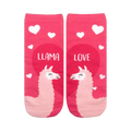 Crew socks in pink with a fun design. Two llamas nuzzle each other inside a heart, surrounded by smaller hearts. Text reads 'Llama Love'.
