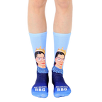 A pair of women's crew socks in light blue and navy blue. The socks feature a portrait of Ruth Bader Ginsburg wearing a crown. [lf]