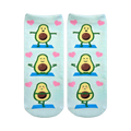 Pair of light blue ankle socks featuring repeating illustrations of cartoon avocados doing yoga poses and surrounded by pink hearts.