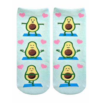 light blue socks with pattern of avocados doing yoga in pink heart sunglasses.   