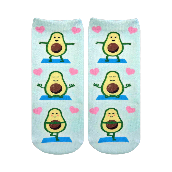 Pair of light blue ankle socks featuring repeating illustrations of cartoon avocados doing yoga poses and surrounded by pink hearts. }}