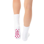 Back view of white fuzzy llama slipper socks, showcasing the pink non-slip grip. [lf]