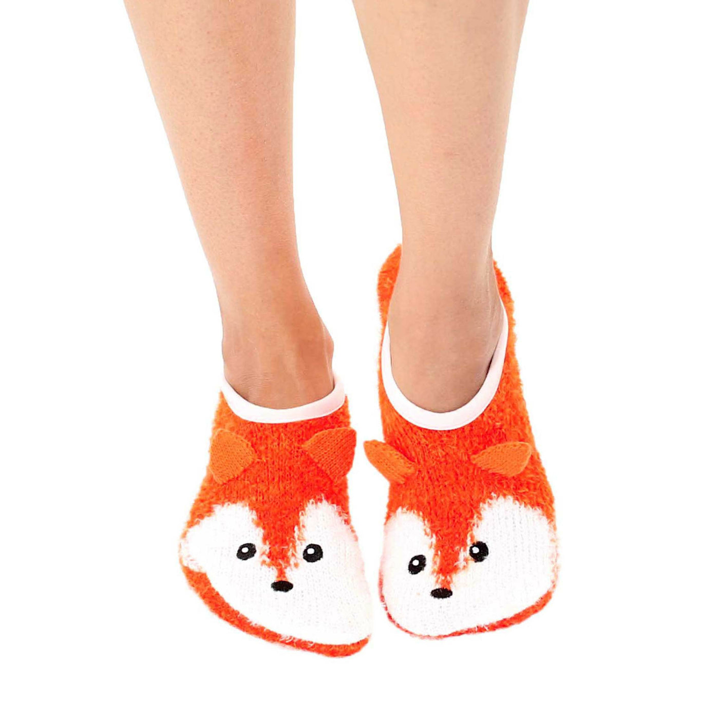 Lifestyle shot: Person wearing orange fuzzy fox slipper socks. Shows the socks' fit and feel. [lf]
