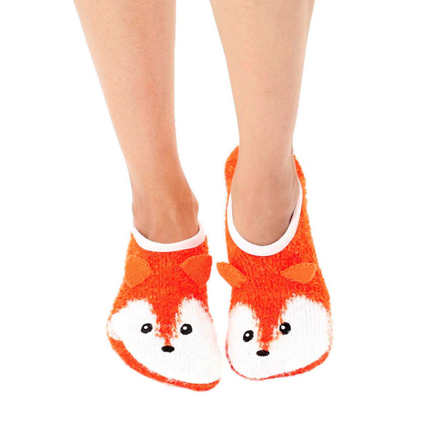 Lifestyle shot: Person wearing orange fuzzy fox slipper socks. Shows the socks' fit and feel. [lf]