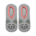 Flat lay product shot of a pair of grey fuzzy cat slipper socks with pink trim.
