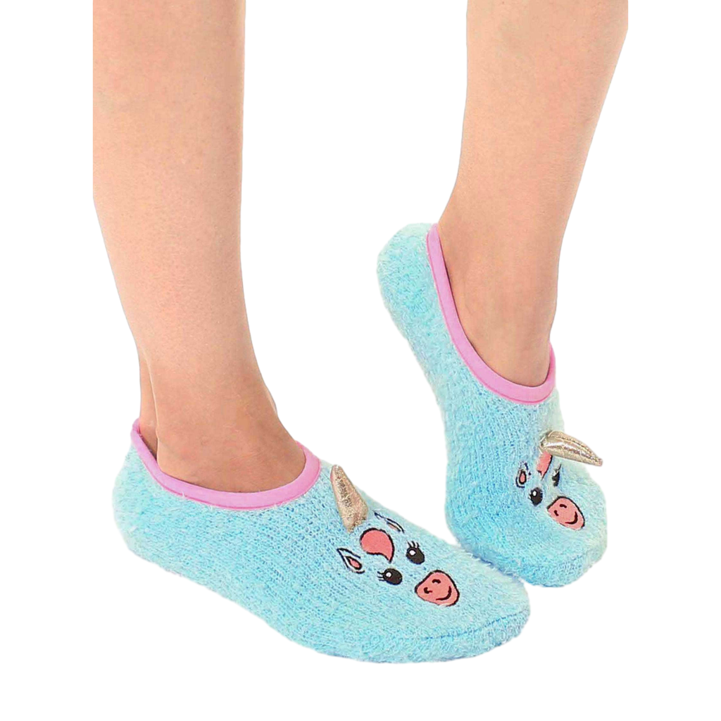 Lifestyle shot of a person wearing the light blue fuzzy unicorn slipper socks; showcasing comfort and fit. [lf]
