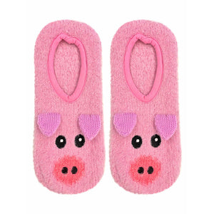 A pair of pink fuzzy socks with pig faces on the toes.