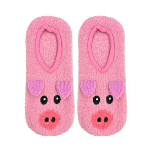 Flatlay product shot of a pair of pink fuzzy pig slipper socks.