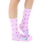 Lifestyle shot of 'Allergic To Drama' socks on a model's legs, showing the socks' fit and pattern on the leg. [lf]