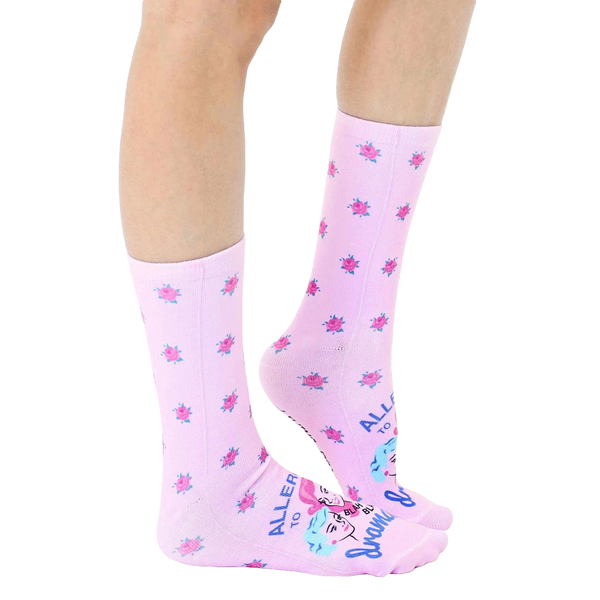 Lifestyle shot of 'Allergic To Drama' socks on a model's legs, showing the socks' fit and pattern on the leg. [lf]