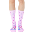A pair of pastel pink crew socks with a scattered rose pattern and 'Allergic To Drama' graphic featuring two illustrated faces. [lf]