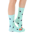 Lifestyle shot showing the 'Champion of F Bombs' socks on a person's legs, showcasing the fit and overall look. [lf]