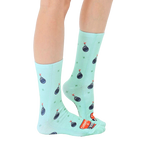 Lifestyle shot showing the 'Champion of F Bombs' socks on a person's legs, showcasing the fit and overall look. [lf]