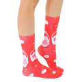Lifestyle shot showing 'Hot Mess' socks on a person's legs, highlighting the sock's fit and design in a casual setting. [lf]