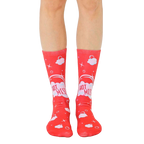 Pair of red crew socks with a playful design.  Features a 'Hot Mess' slogan inside pastel pink speech bubbles, surrounded by clouds and sparkles. [lf]