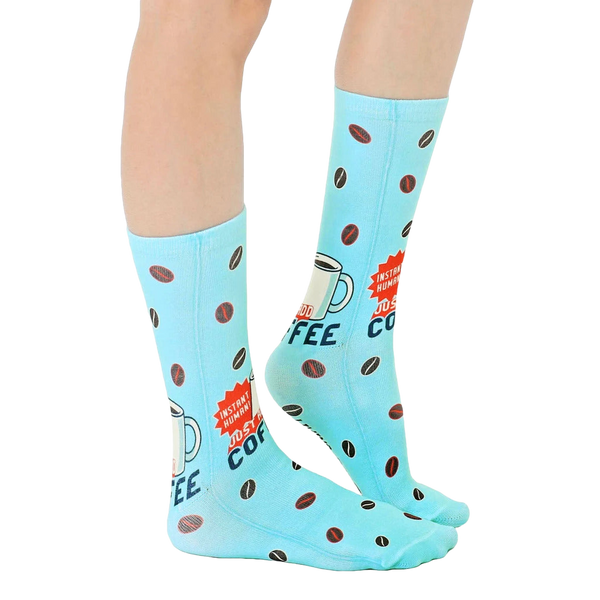 Lifestyle shot of Instant Human coffee socks on a person's feet, showcasing how they look when worn. [lf]