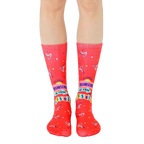 Pair of red crew socks featuring a playful 'unsubscribe from your issues' graphic with 90s-inspired design elements. [lf]