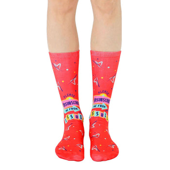 red crew socks with "please unsubscribe me from your issues" in light blue and yellow lettering with stars and hearts. for men and women.   