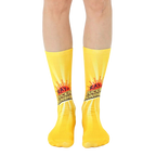 A pair of yellow crew socks with a graphic of a sun and the phrase 'Ray of Fucking Sunshine'. [lf]