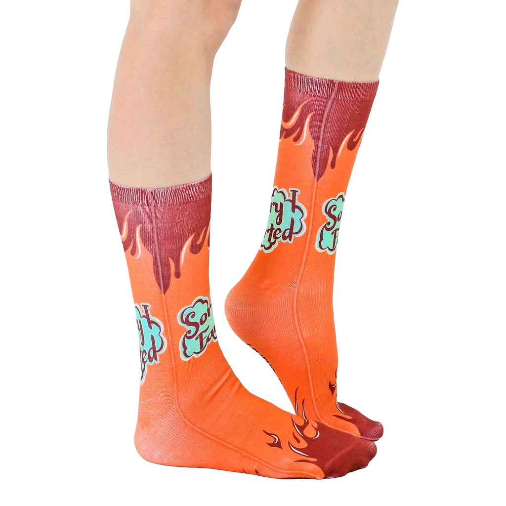Lifestyle shot showing the 'Sorry I Farted' socks on a person's feet, highlighting their fit and style. [lf]