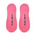 Flat lay product shot showing the bottom of the pink no-show socks with 'Living Royal' printed on the soles.