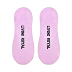 Flatlay product shot showing both 'Nap Queen' no-show socks. The socks are light purple with black text that says 'Living Royal' on the soles.