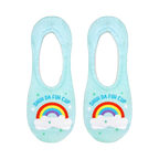 Another flatlay showcasing the socks, clearly displaying the rainbow and text design on a light blue background.
