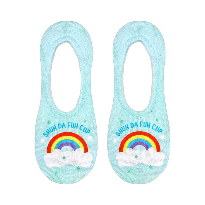 Another flatlay showcasing the socks, clearly displaying the rainbow and text design on a light blue background.