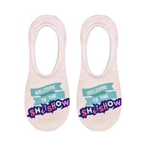 Flat lay product shot of a pair of 'Welcome to the Shitshow' no-show socks.  Shows the sock design clearly.