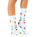 Lifestyle shot showcasing the 'I'm A Fucking Delight' socks on a model's feet. Shows socks from the side, highlighting fit and feel. [lf]