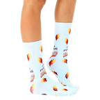 Lifestyle shot showcasing the 'I'm A Fucking Delight' socks on a model's feet. Shows socks from the side, highlighting fit and feel. [lf]