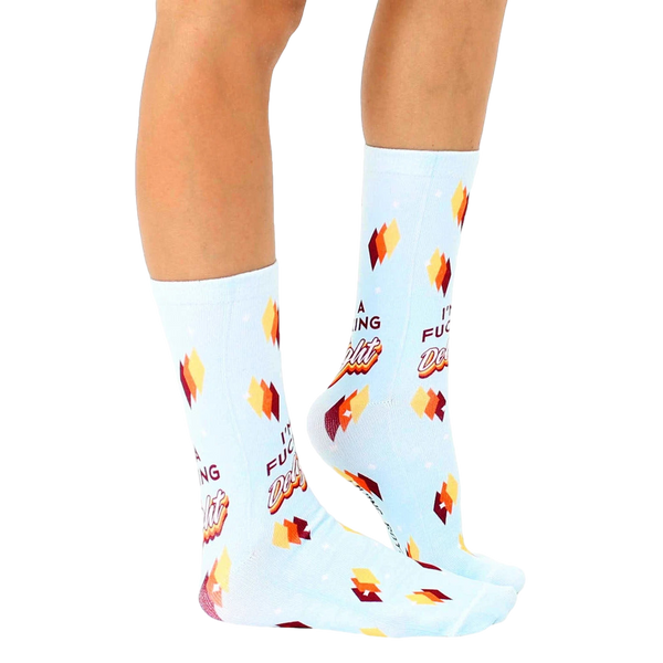 Lifestyle shot showcasing the 'I'm A Fucking Delight' socks on a model's feet. Shows socks from the side, highlighting fit and feel. [lf]