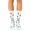 Pair of light blue crew socks with a retro-style design and the phrase "I'm a Fucking Delight" in orange and brown lettering. [lf]