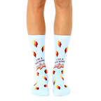 Pair of light blue crew socks with a retro-style design and the phrase "I'm a Fucking Delight" in orange and brown lettering. [lf]