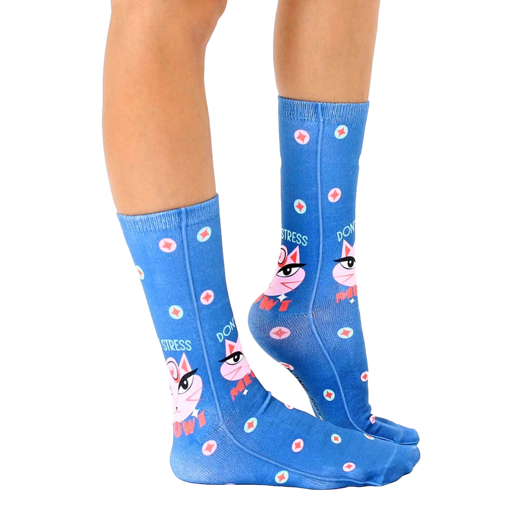 Lifestyle photo showcasing the 'Don't Stress Meowt' socks on a person's feet, highlighting their fit and style. [lf]
