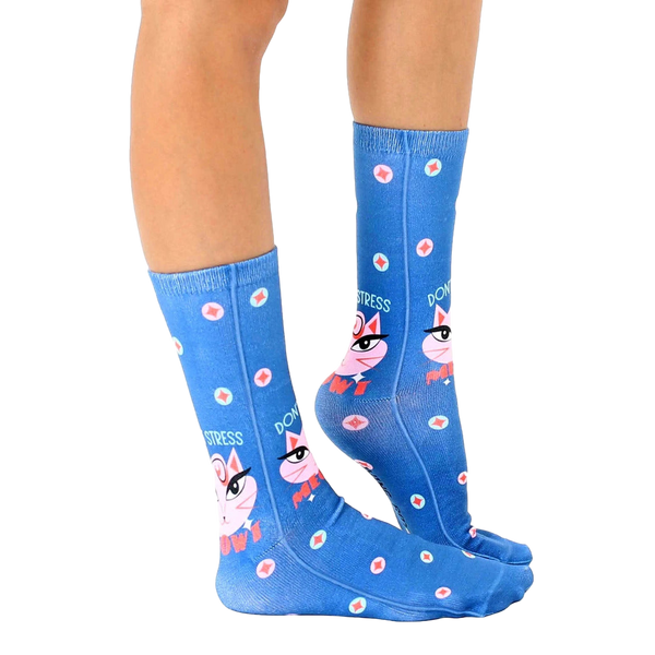 Lifestyle photo showcasing the 'Don't Stress Meowt' socks on a person's feet, highlighting their fit and style. [lf]